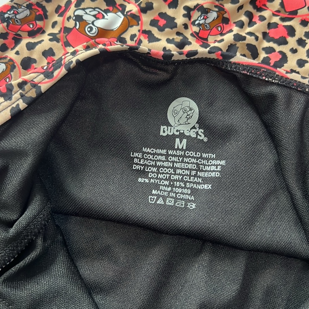 Buc-ee's women’s black/orange leopard swimsuit Size M (never worn/no tags) - Picture 3 of 4